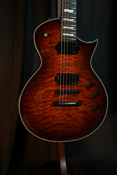 Close-up of ESP E-II Eclipse Tiger Eye Sunburst Fishman Fluence Modern Humbucker pickups and Gotoh bridge
