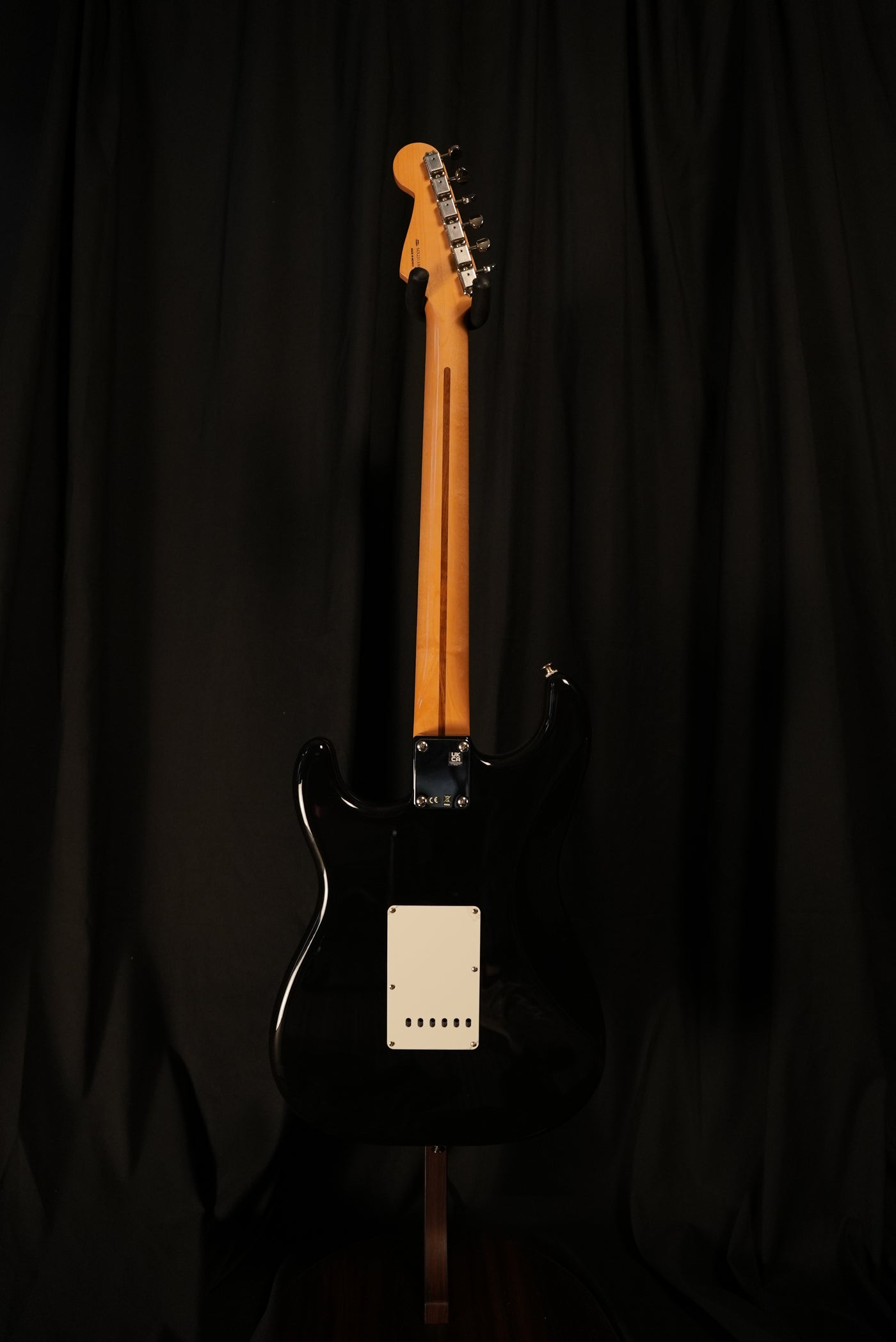 Full angle Rear view of Fender Vintera II ’50s Stratocaster Black showing alder body and gloss polyester finish