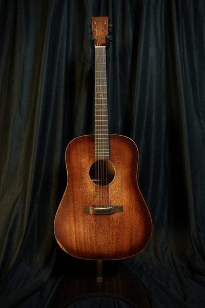 Angled full-body view of Martin D-15M StreetMaster showing the distressed satin finish and dreadnought silhouette