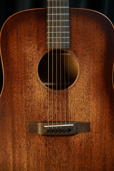 Detail shot of Martin D-15M StreetMaster soundhole and multi-stripe rosette on mahogany top