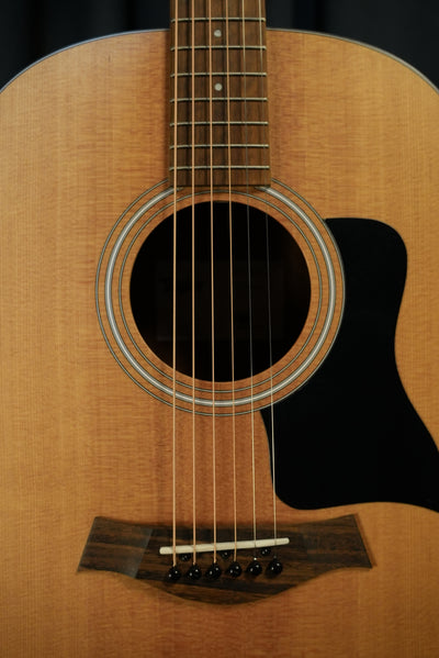 Close up of Taylor 117e torrefied spruce top and soundhole rosette