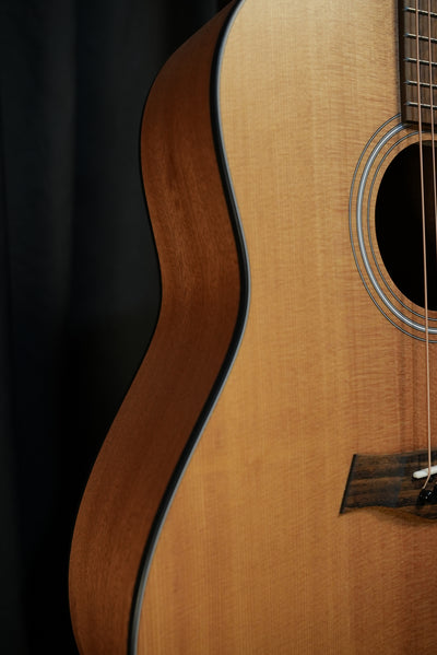 Close up of Taylor 117e torrefied spruce top and soundhole rosette