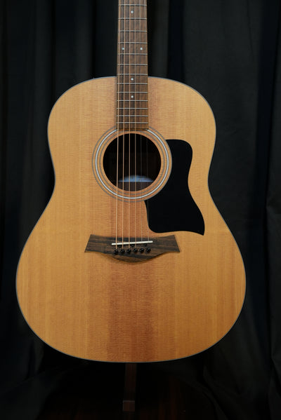 Front view of Taylor 117e Grand Pacific acoustic electric guitar with torrefied spruce top
