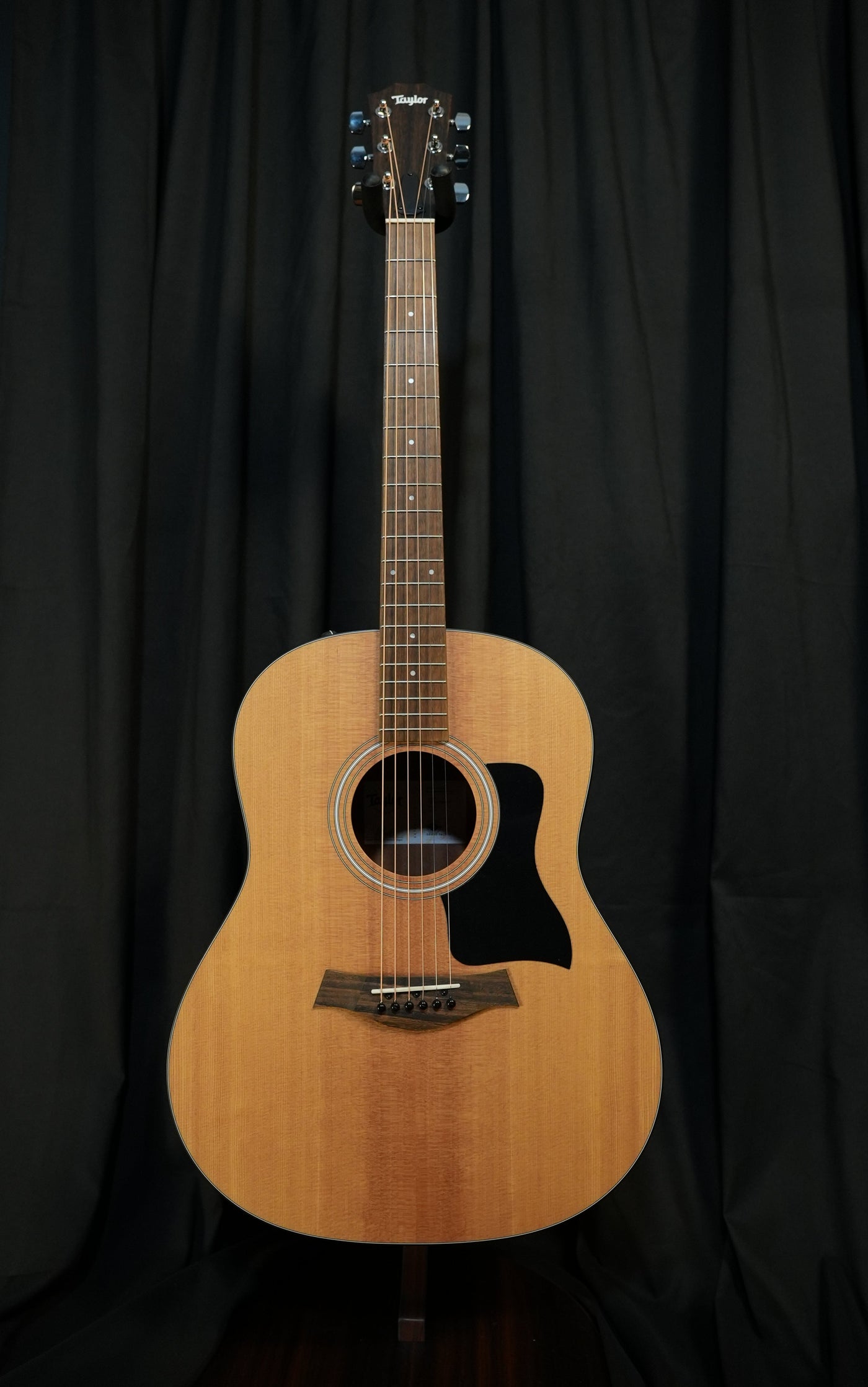 Full body view of Taylor 117e Grand Pacific acoustic electric guitar showing entire spruce top and body shape