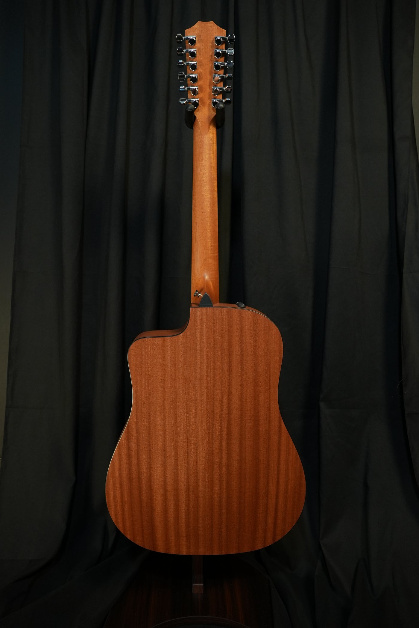 Rear view of the Taylor 150ce showing layered sapele back, matte finish and overall craftsmanship – designed for durability and tone.