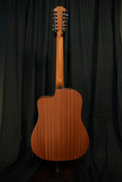 Rear view of the Taylor 150ce showing layered sapele back, matte finish and overall craftsmanship – designed for durability and tone.