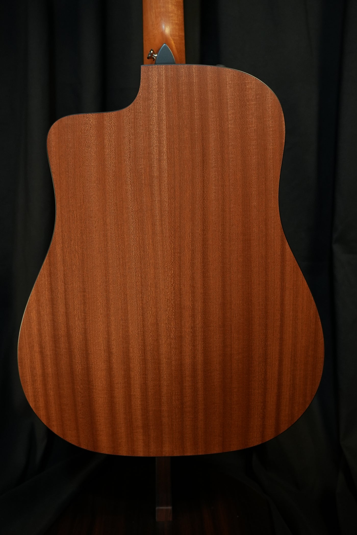 Rear view of the Taylor 150ce showing layered sapele back, matte finish and overall craftsmanship – designed for durability and tone.