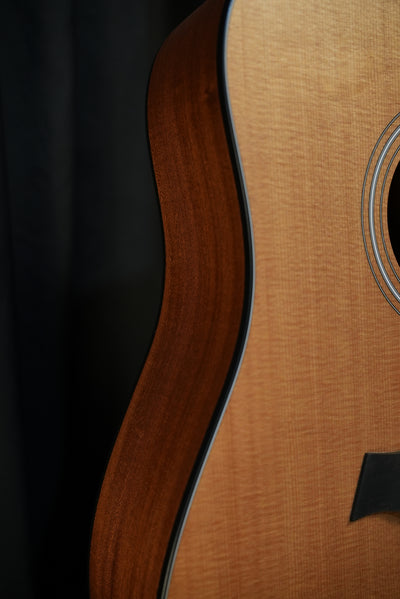 Detailed shot of the Taylor 150ce with its side profile showing the torrified top