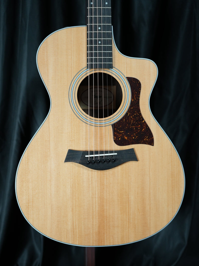 Taylor Full front view of the Taylor 212ce showing torrefied Sitka spruce top and Grand Concert body shape.