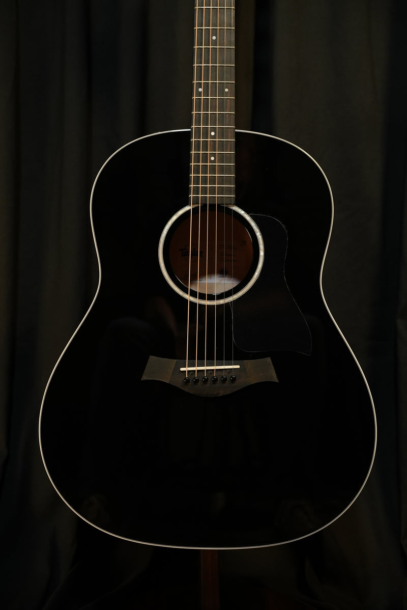 Full front view of the Taylor 217e-BLK Plus showing torrefied spruce top and Grand Pacific body in gloss black finish.