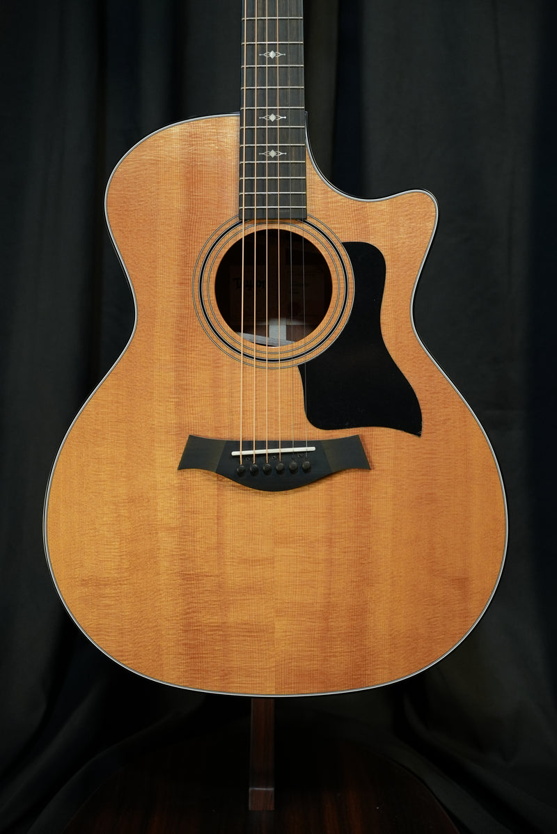 Full front view of the Taylor 314ce showing solid Sitka spruce top and Grand Auditorium body.