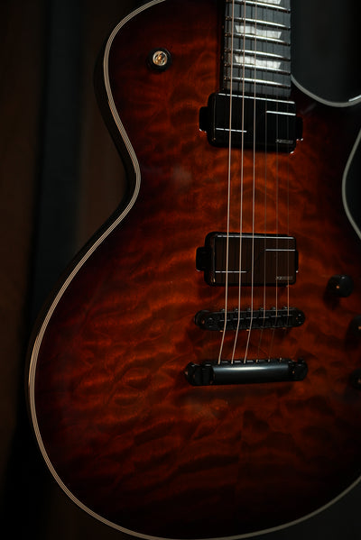 Close-up of ESP E-II Eclipse Tiger Eye Sunburst Fishman Fluence Modern Humbucker pickups and Gotoh bridge
